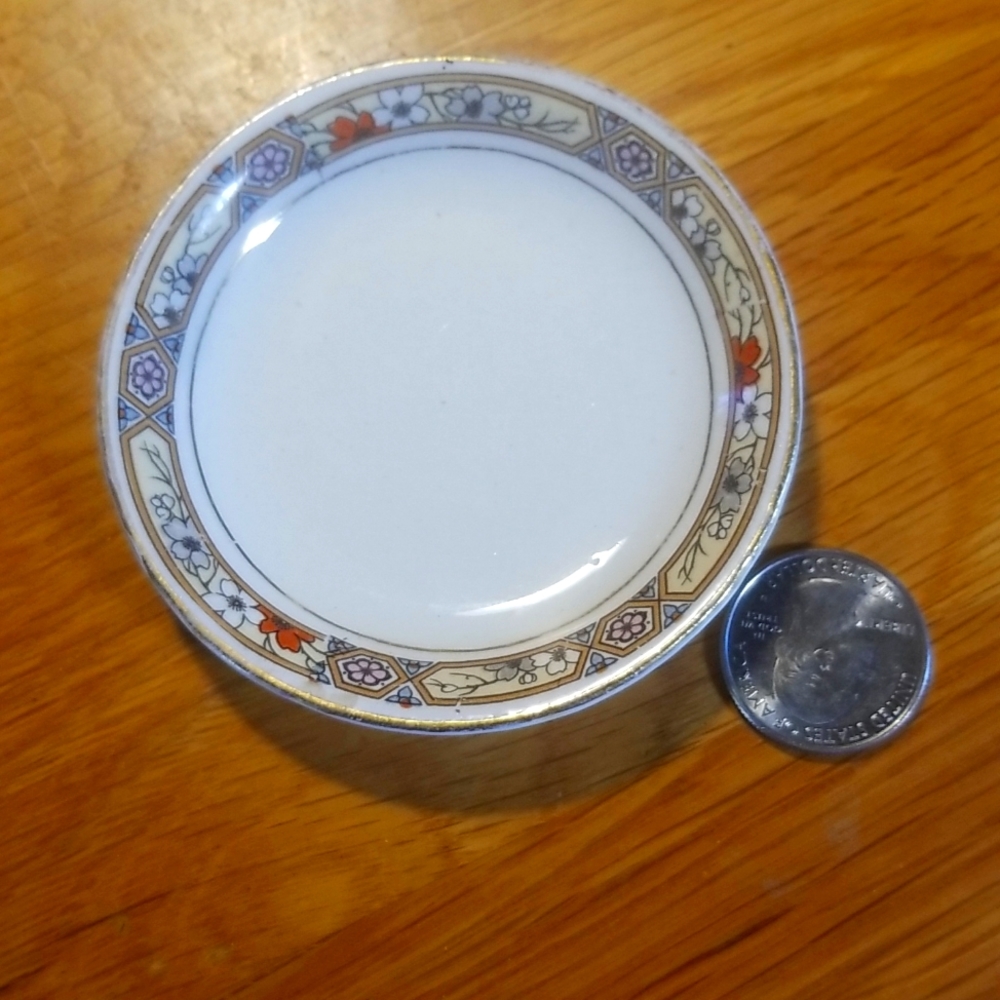 Tiny vintage 3in. across miniature plate